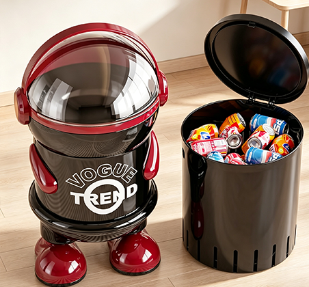 Astronaut-Inspired Flip-Top Trash Can with Transparent Dome & "VOGUE TREND" Print | Stylish Cartoon Waste Bin with Handle, Arms & Chunky Shoes for Living Room, Kids' Room & Office